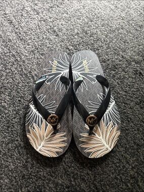Michael Kors Black and Tan Palm-Print Logo Flip Flops